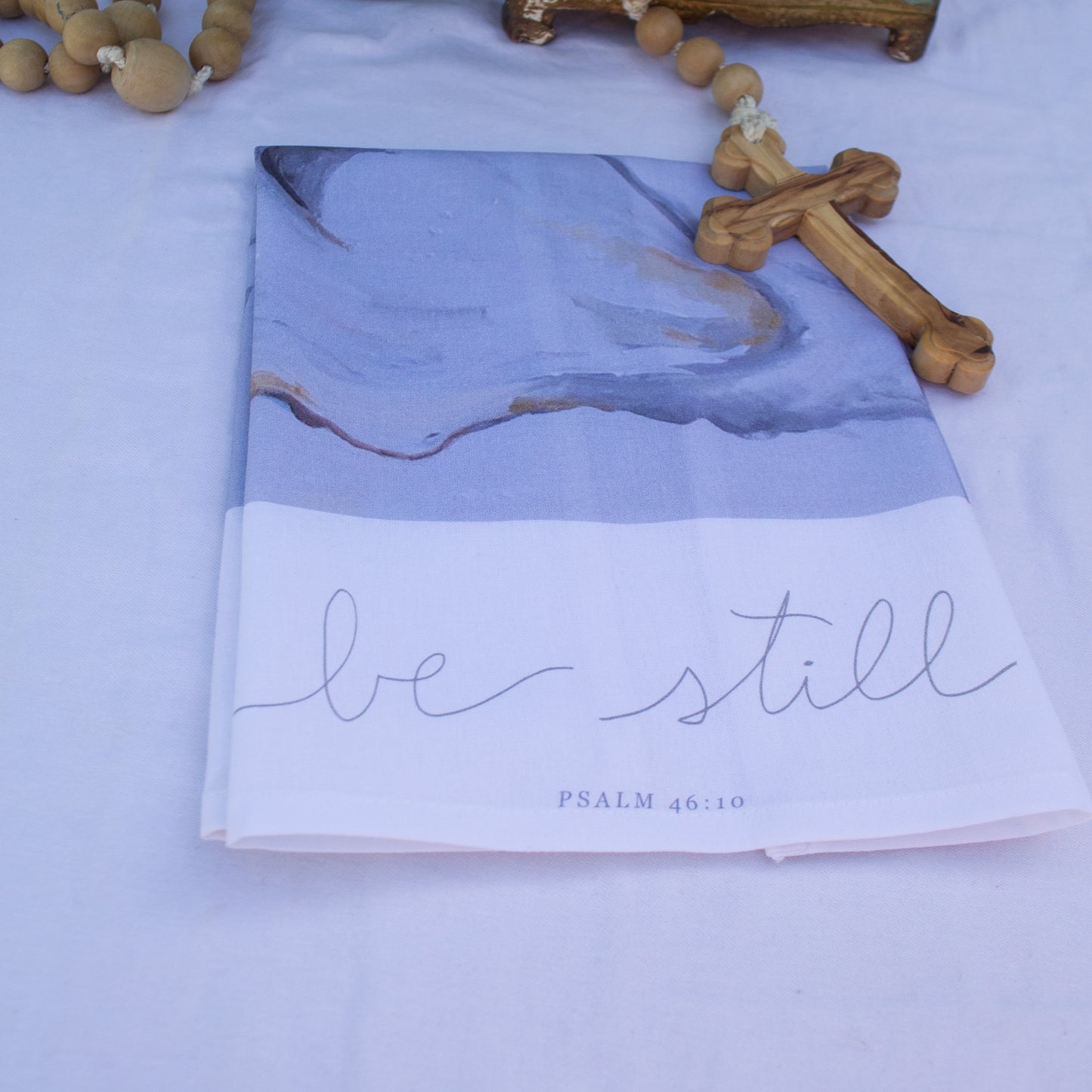 Oyster painting with Psalm 46:10 "Be Still" on a tea towel