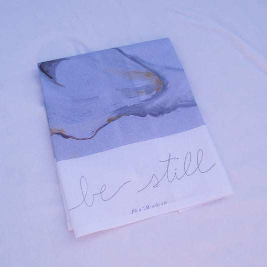 Oyster painting with psalm 46:10 "Be Still" on a tea towel